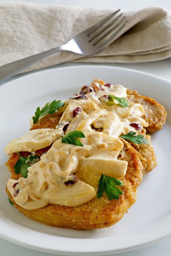 Pork chops with creamy apple cranberry sauce