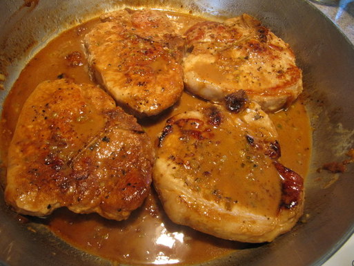 Pork chops with flaming apricot bourbon sauce