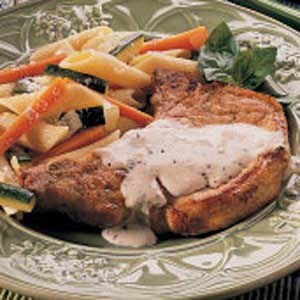 Pork chops with herbed cream sauce