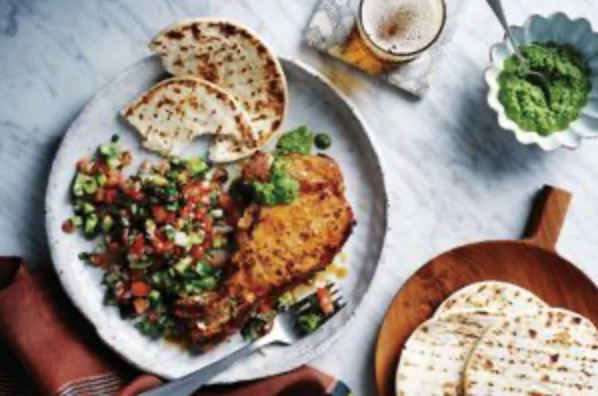 Pork chops with onion salad and coriander chutney