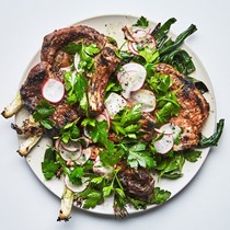 Pork chops with radishes and charred scallions