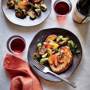 Pork chops with sautéed apples and Brussels sprouts