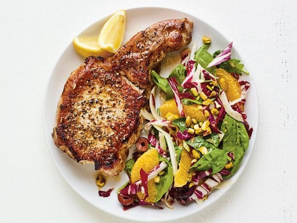 Pork chops with Sicilian salad