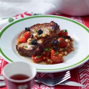 Pork chops with spiced baked beans