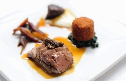 Pork cooked three ways with cauliflower purée, Swiss chard and ravigote sauce