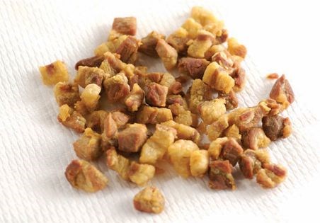 Pork cracklings and rendered pork fat (lard)
