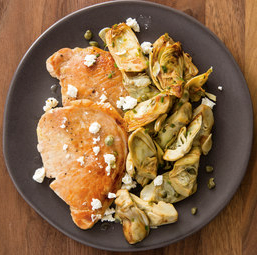 Pork cutlets with artichokes and goat cheese