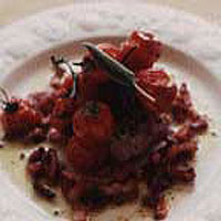 Pork fillets with tomato, lardons and sage