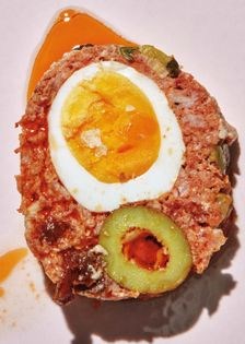 Pork galantine with pickle, eggs, and cheese (Embutido)