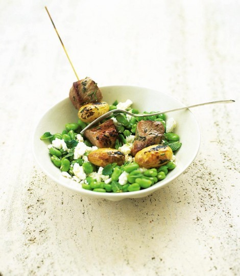 Pork kebabs on minted broad beans with feta