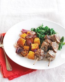 Pork kebabs with roasted squash and sautéed greens