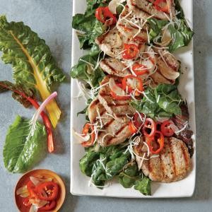 Pork loin medallions with spicy greens and provolone