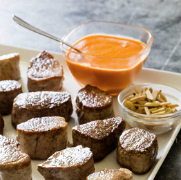 Pork medallions with red pepper sauce