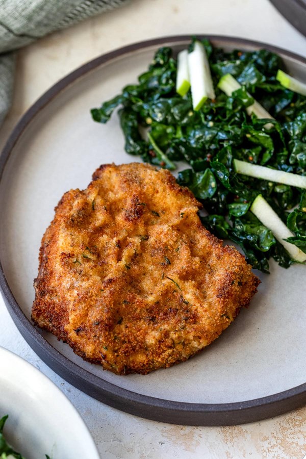 Pork Milanese with kale and apple salad