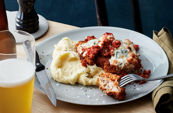 Pork neck schnitzel with Bolognese and mash