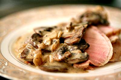 Pork roast with cardamom mushroom sauce