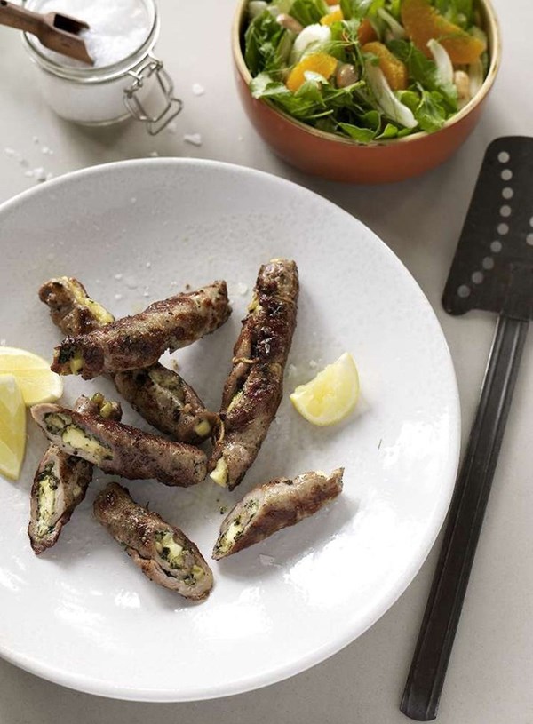 Pork scallopine with feta and pine nuts
