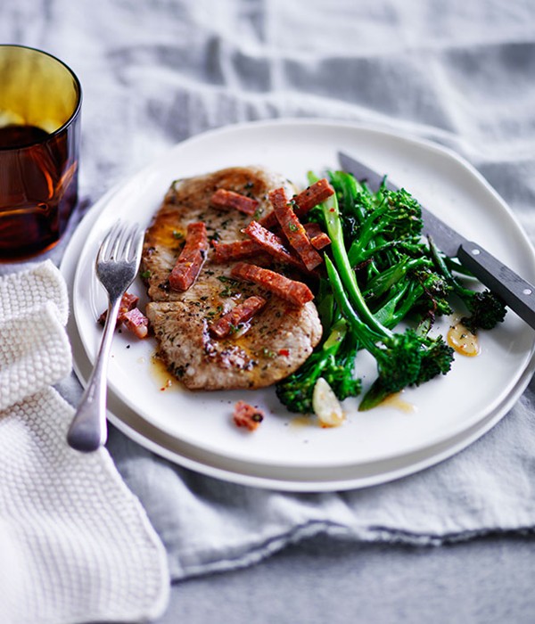 Pork schnitzel with broccolini and sopressa