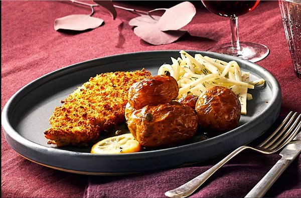 Pork schnitzel with cheat's celeriac remoulade & crispy potatoes