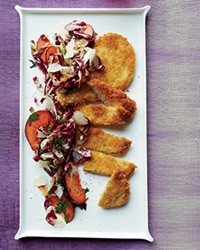 Pork schnitzel with plum, parsley and radicchio salad