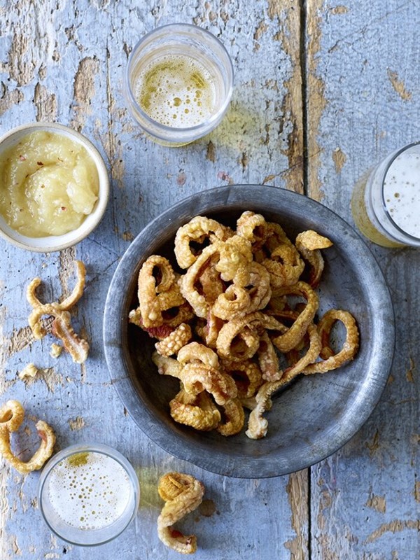 Pork scratchings with spiced apple sauce