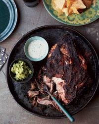 Pork shoulder roast with citrus mojo and green sauce