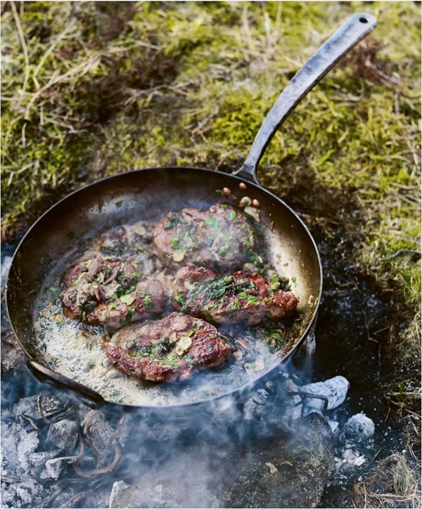 Pork shoulder steaks with chilli, garlic, capers and anchovies