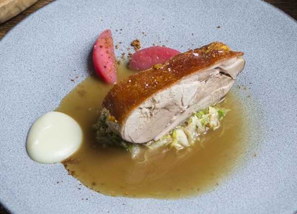 Pork shoulder with hispi cabbage and apples