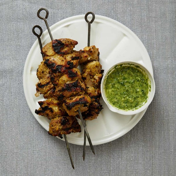 Pork skewers with coriander and mint dip