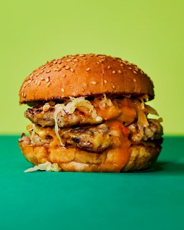 Pork smash burgers with smoked cheddar, ‘kraut and peach mustard 