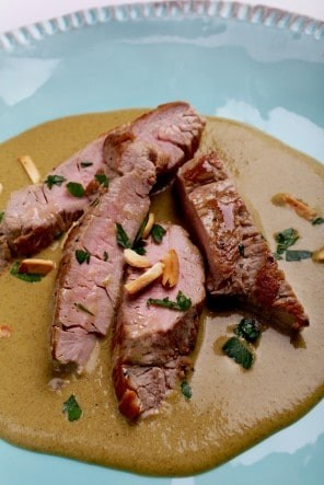 Pork steaks with creamy almond sauce