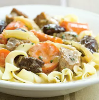 Pork stew with fennel, leeks, and prunes