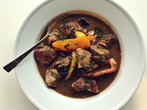 Pork stew with peppers and olives