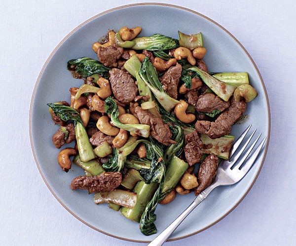 Pork stir-fry with baby bok choy and cashews