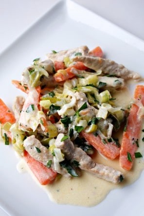 Pork strips with carrot and leeks in chevre sauce