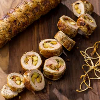 Pork tenderloin roulade with bacon, apple, and Gruyère