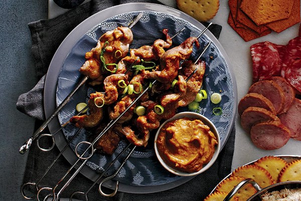 Pork tenderloin skewers with easy peanut sauce