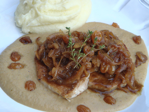 Pork tenderloin with apple cider, golden raisins and two sauces