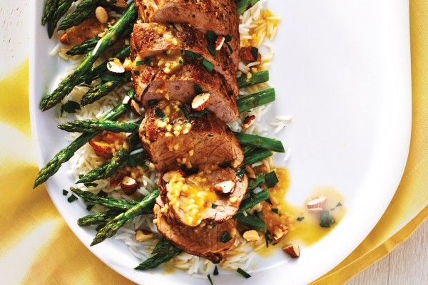 Pork tenderloin with roasted asparagus and warm citrus sauce