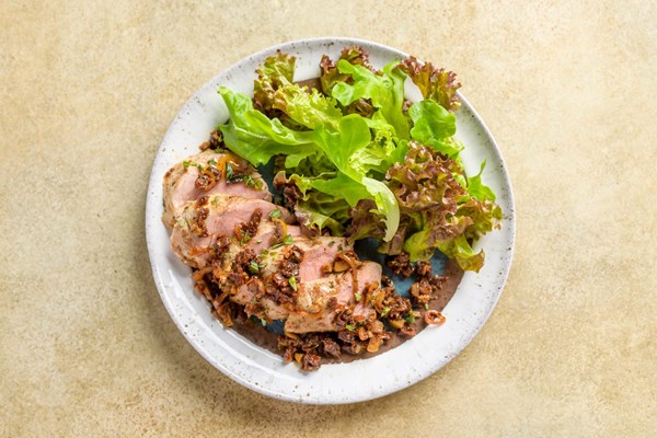Pork tenderloins with sun-dried tomatoes and green olives