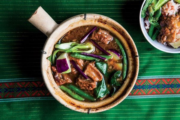 Pork, vegetable, and tamarind stew (Sinigang) soup