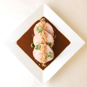 Pork with mole negro sauce (Puerco en mole negro)