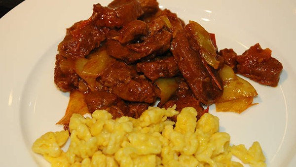 Porkolt with nokedli and cucumber salad