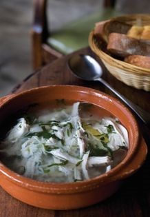 Portuguese chicken broth with rice, mint and lemon (Canja)