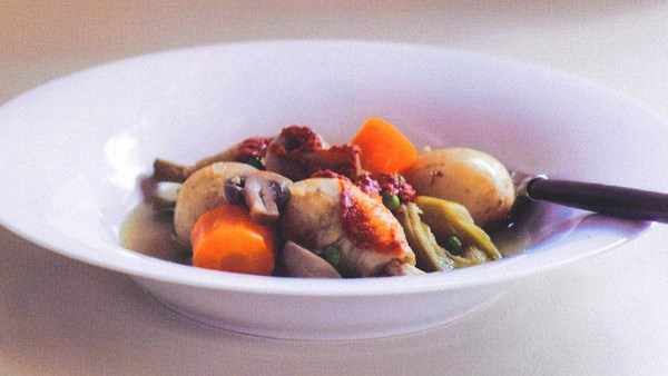 Pot-braised chicken drumsticks with vegetables and harissa