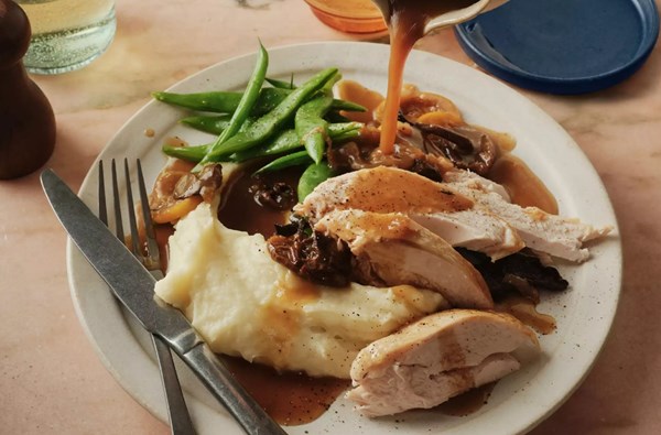 Pot-roast chicken with caramelised lemon, thyme & mushroom sauce