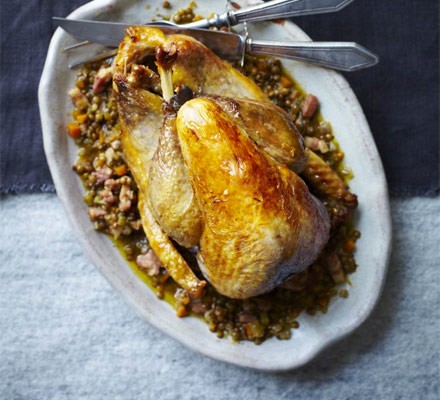 Pot-roast guinea fowl with lentils, sherry & bacon