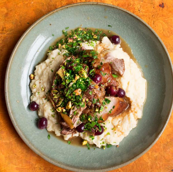 Pot-roast knuckle of pork with grapes