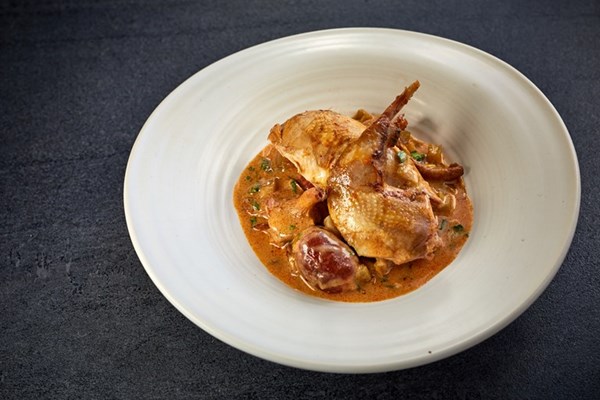 Pot-roast partridge with chorizo, Jerusalem artichoke and wild mushroom stew