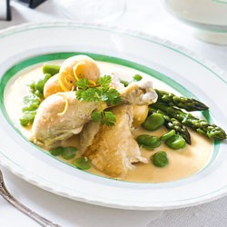 Pot-roasted tarragon chicken with potatoes, asparagus and broad beans